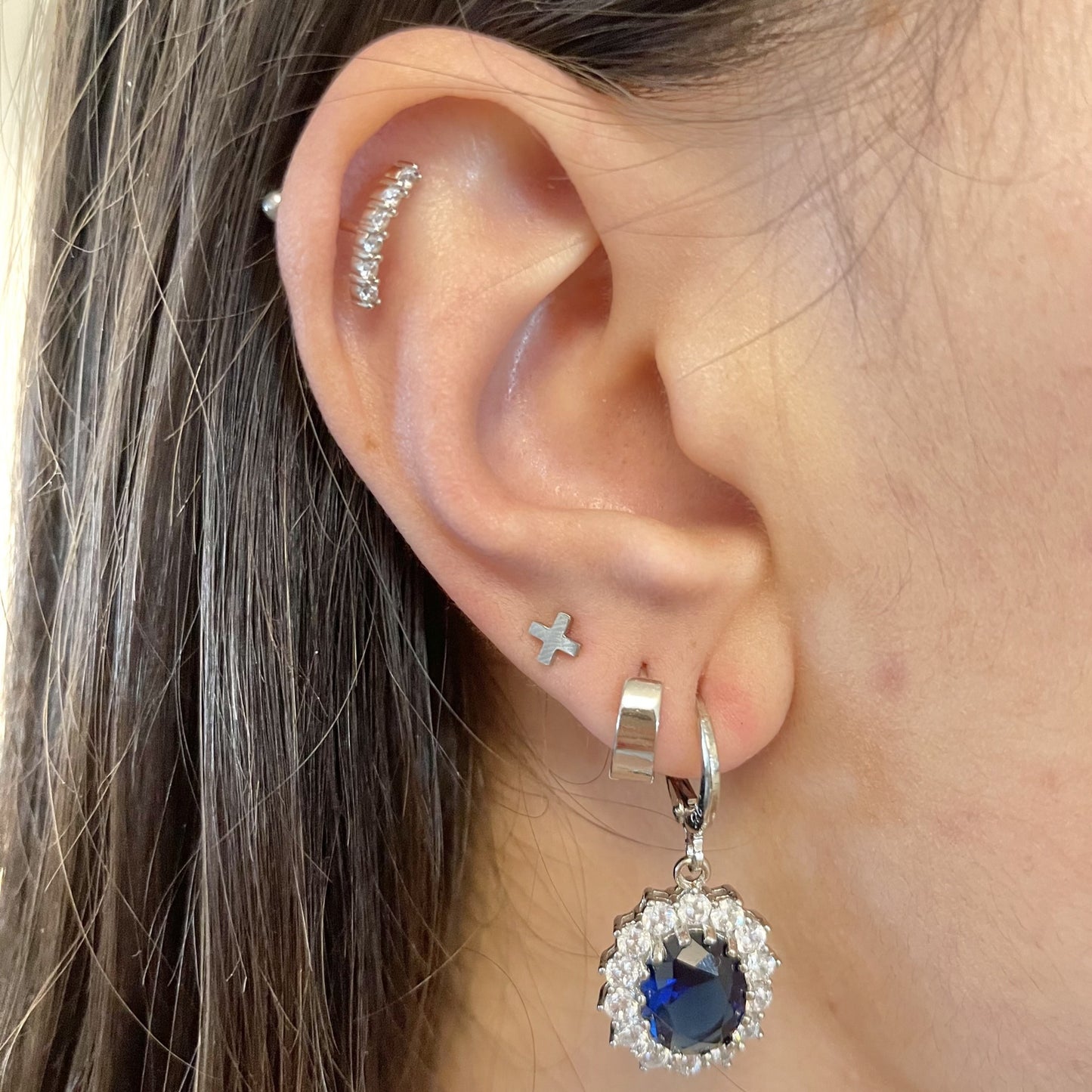 Trust Cross Stud Earrings in White Gold